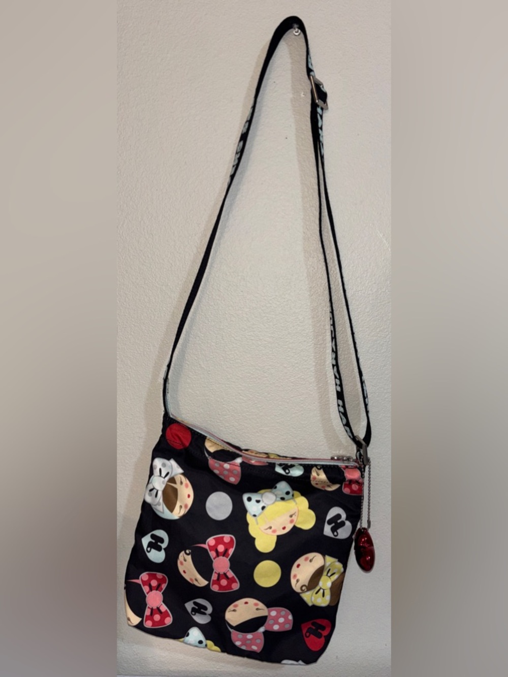 JuJuBE Tokidoki Cartoon Print Crossbody bag w heart charm, zip closure